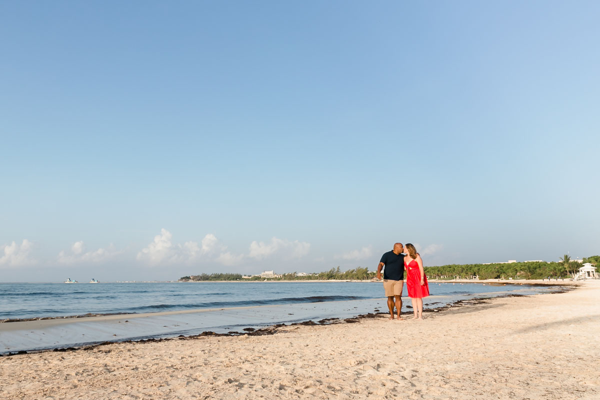 RyannAndWifeKissOnBeachWalkAtPuntaEsmeralda