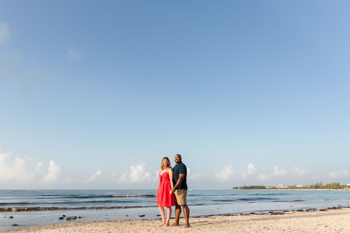 RyannAndWifeHoldHandsOnBeachAtPuntaEsmeralda