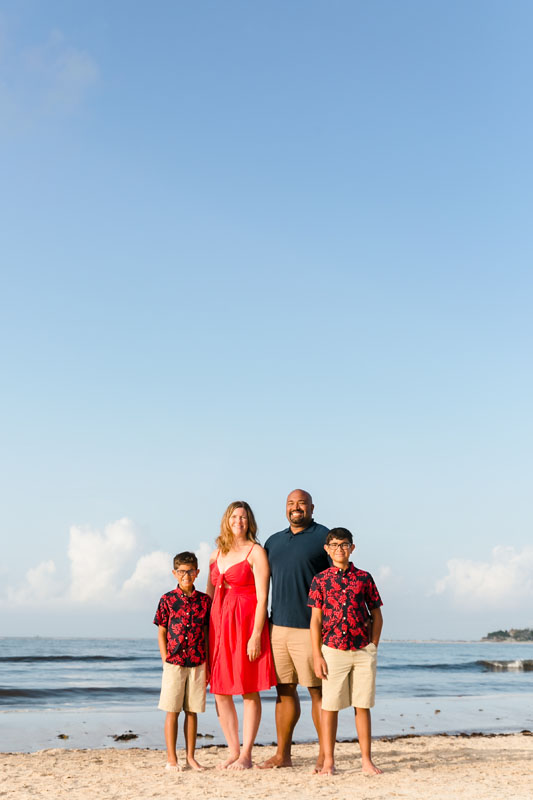 RyannAndFamilyPoseSmilingOnPuntaEsmeraldaBeach
