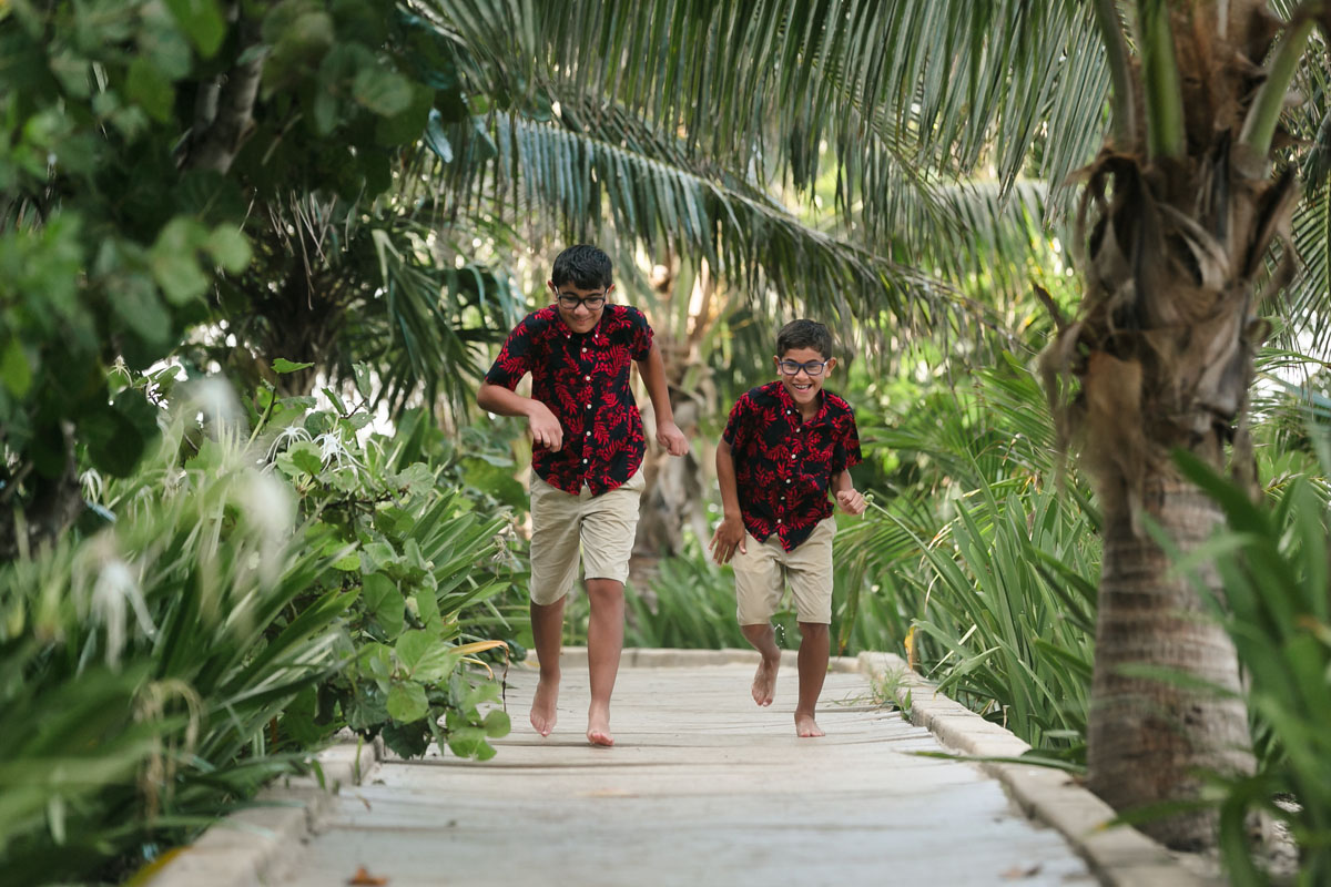 BoysRunOnJunglePathwayAtPuntaEsmeralda