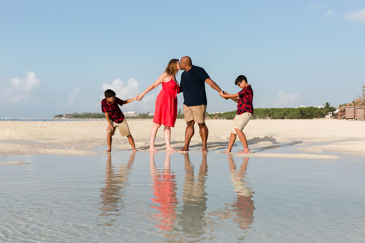 BoysTugKissingParentsApartByTidePool