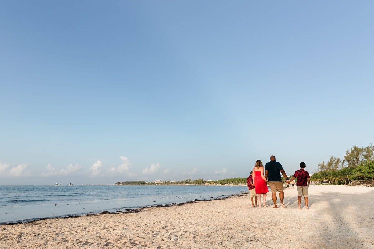 RyannAndFamilyOnBeachWalkAtPuntaEsmeralda
