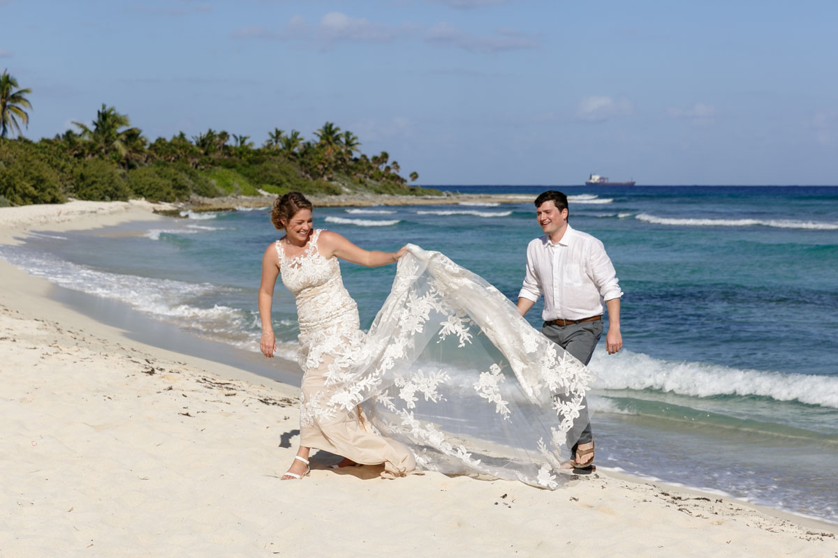 NewlywedsOnBeachWalk