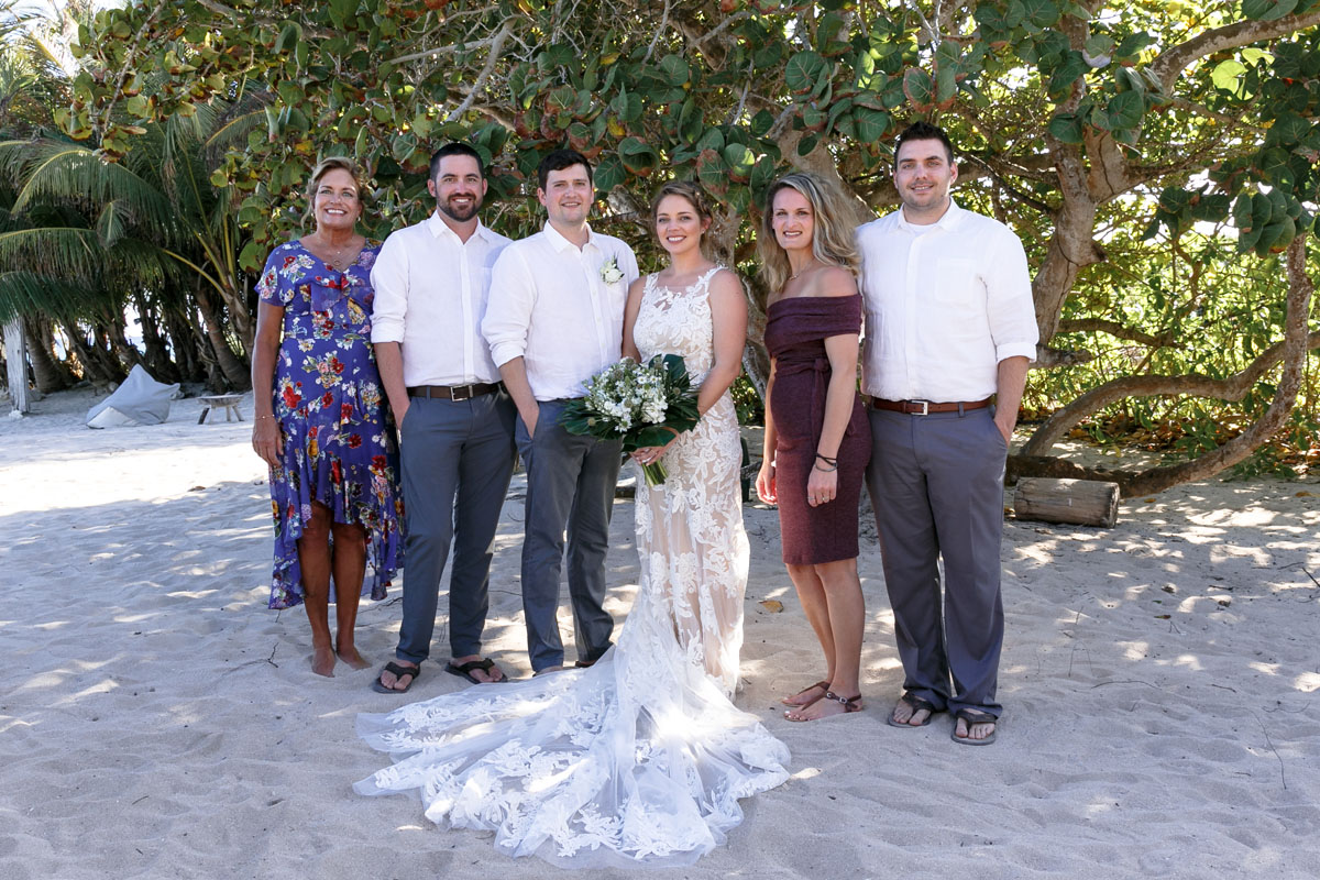 NewlywedsPoseWithFriends