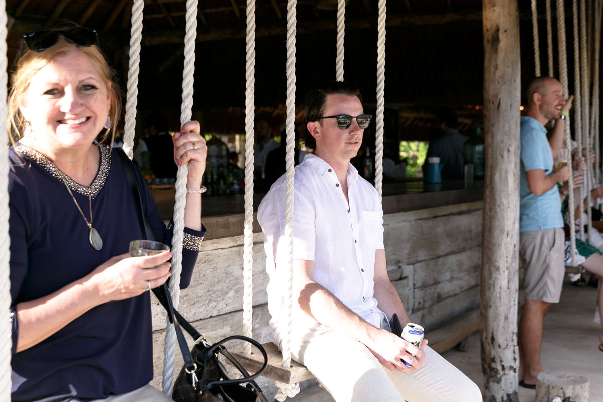 WeddingGuestsRelaxOnSwings