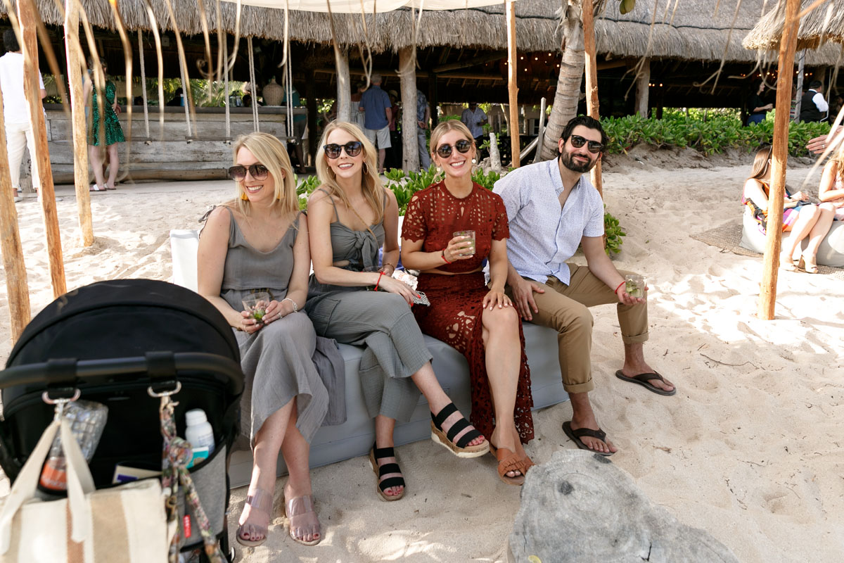 WeddingGuestsRelaxOnBeach