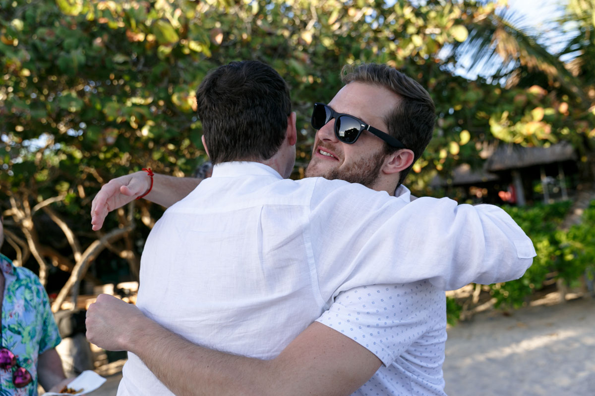 FriendCongratulatesNewlywedGroom