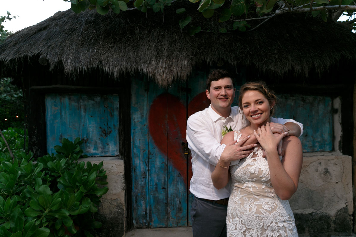 NewlywedsEmbraceInSunsetGlow