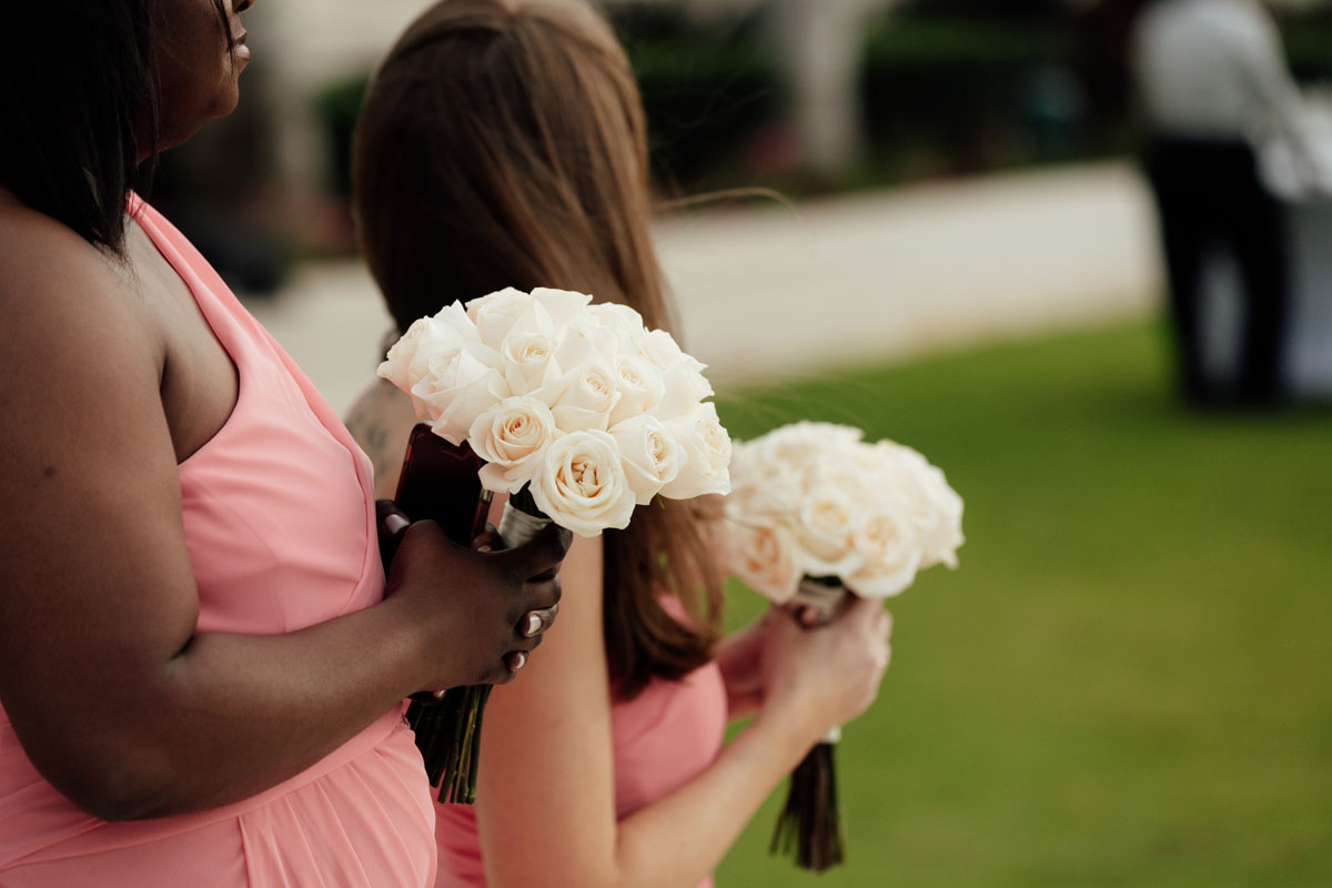 BridesmaidsHoldingWhiteRoseBouquets