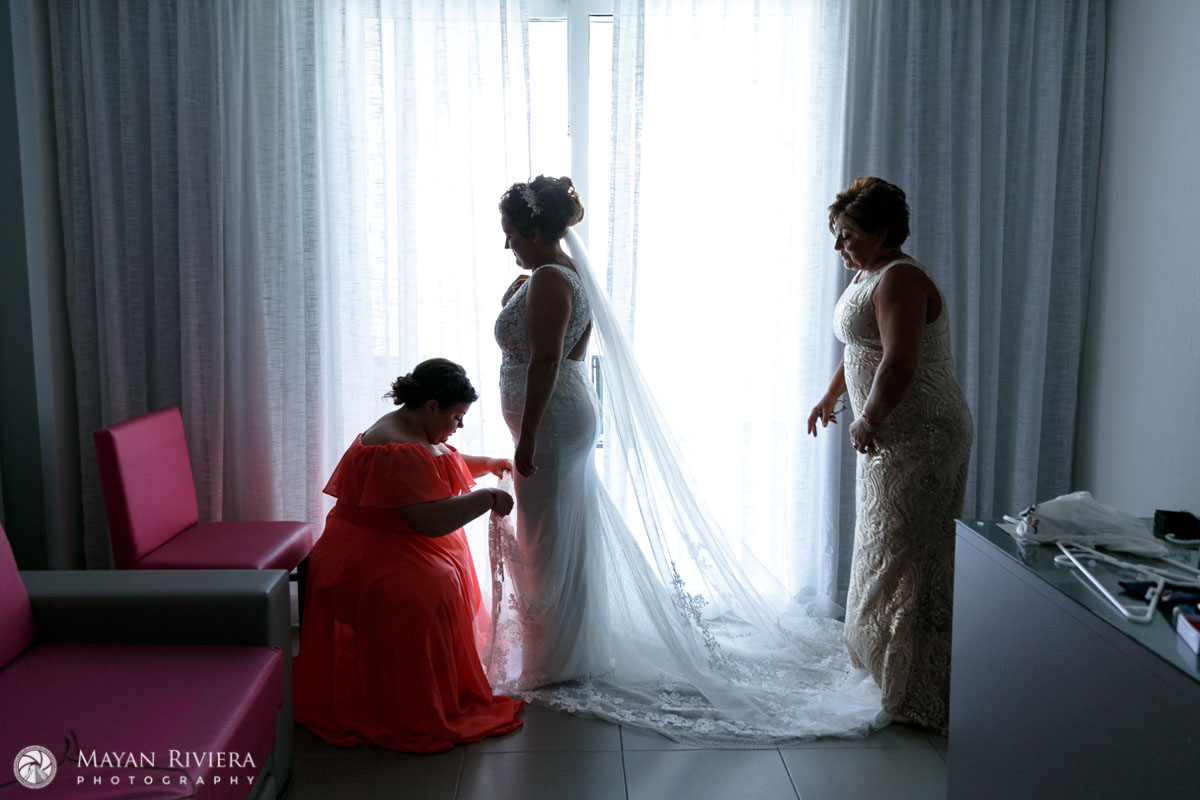 TeamBrideHelpingHerDress