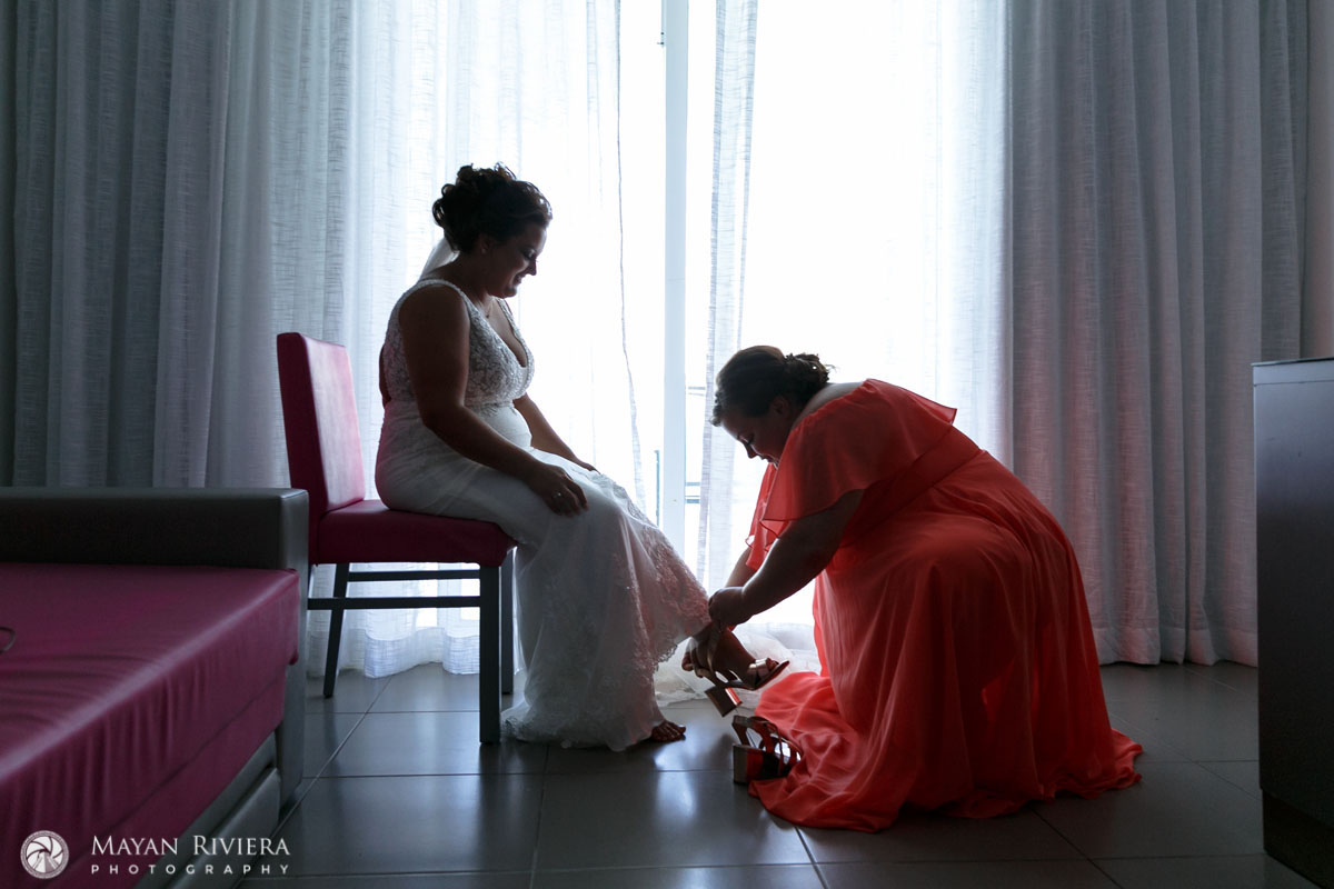 TeamBrideHelpingHerPutOnHeels