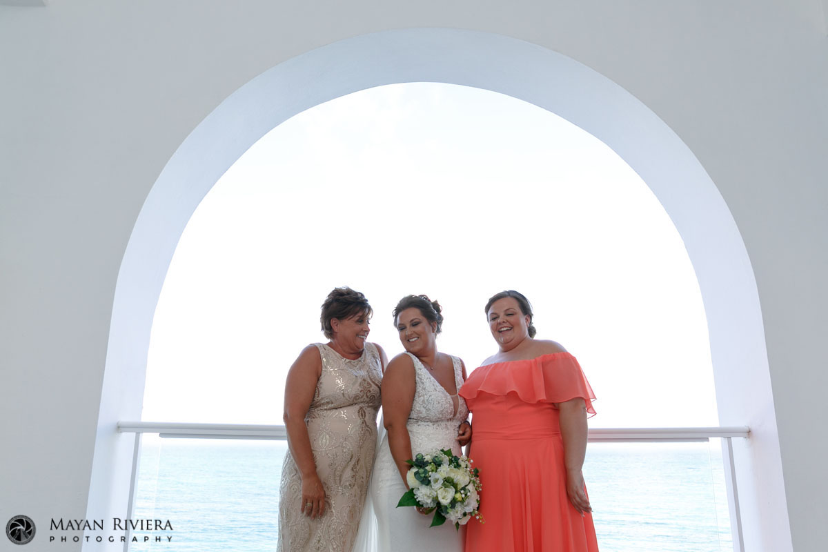 TeamBrideOnBalconyLaughing