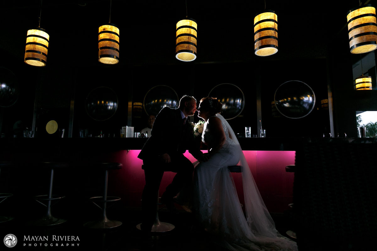 RiuCancunNewlywedsPoseInBar