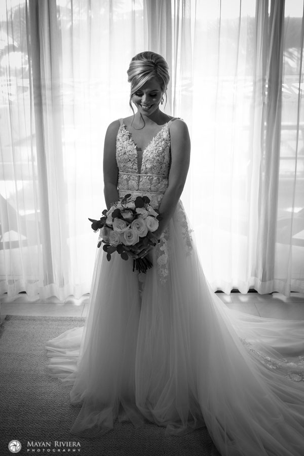 RoyaltonBrideSmilingByWindow