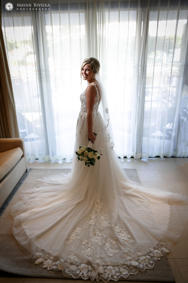 RoyaltonBrideSmilingByWindow