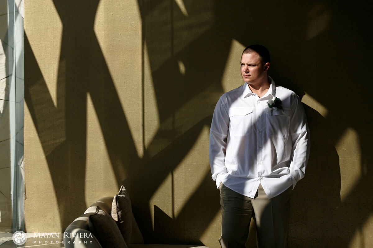 RoyaltonGroomPosesOnShadowWall