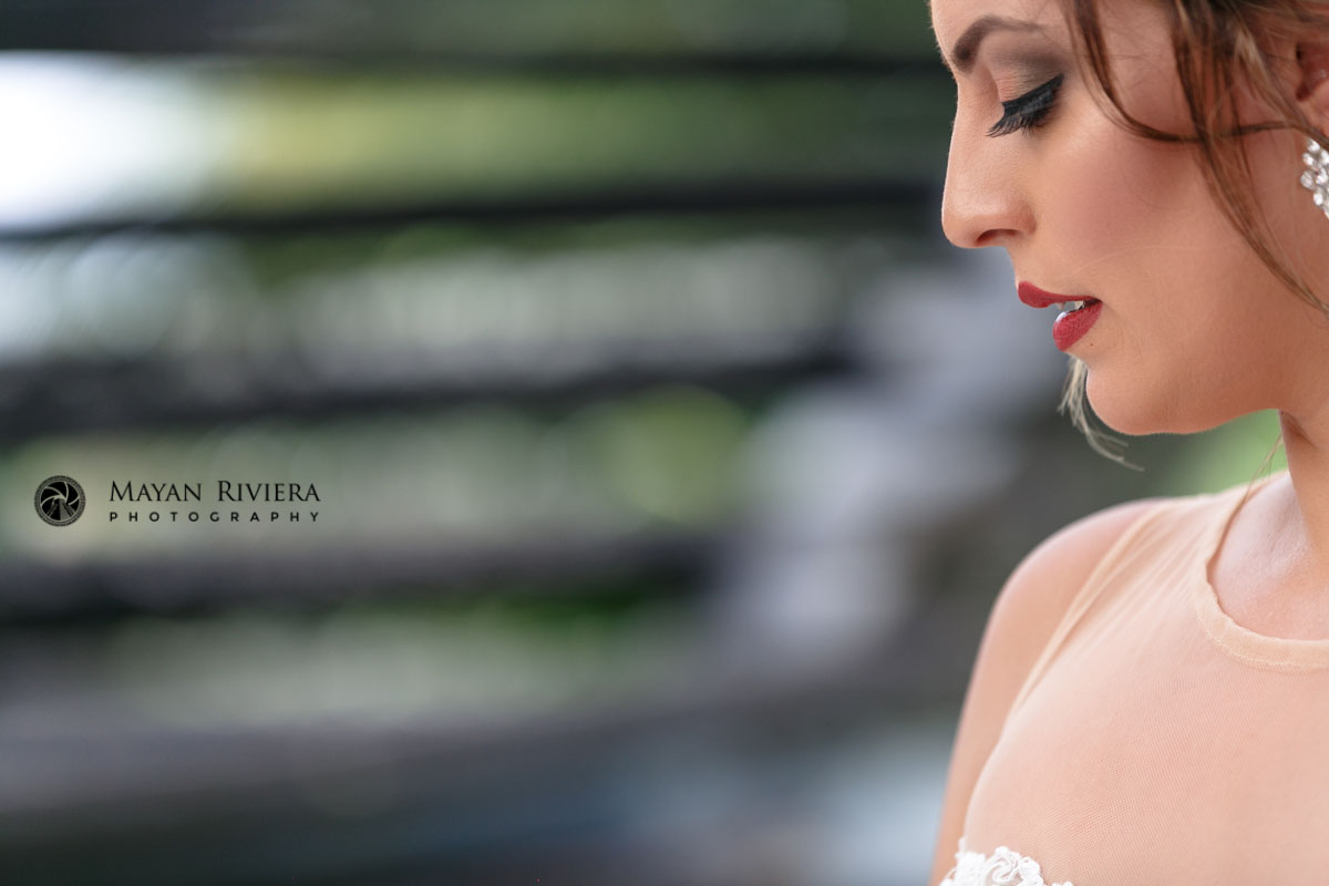 BrideLooksDownAtCeremony