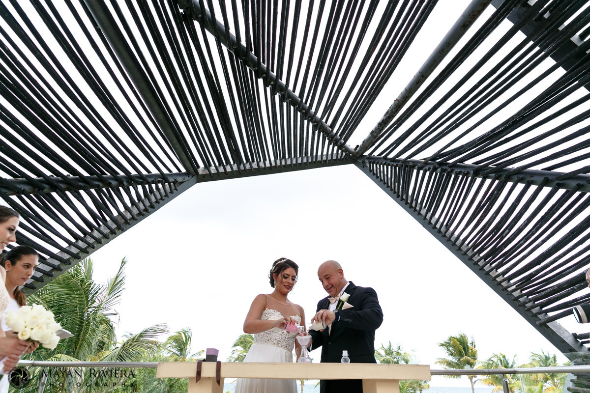 WeddingSandCeremonyUnderRoyaltonArch