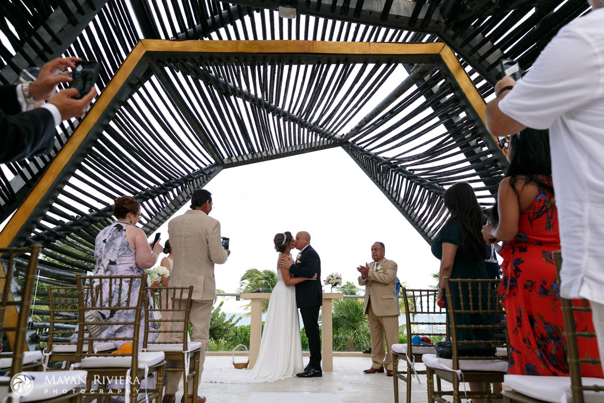 NewlywedsFirstKissUnderRoyaltonArch