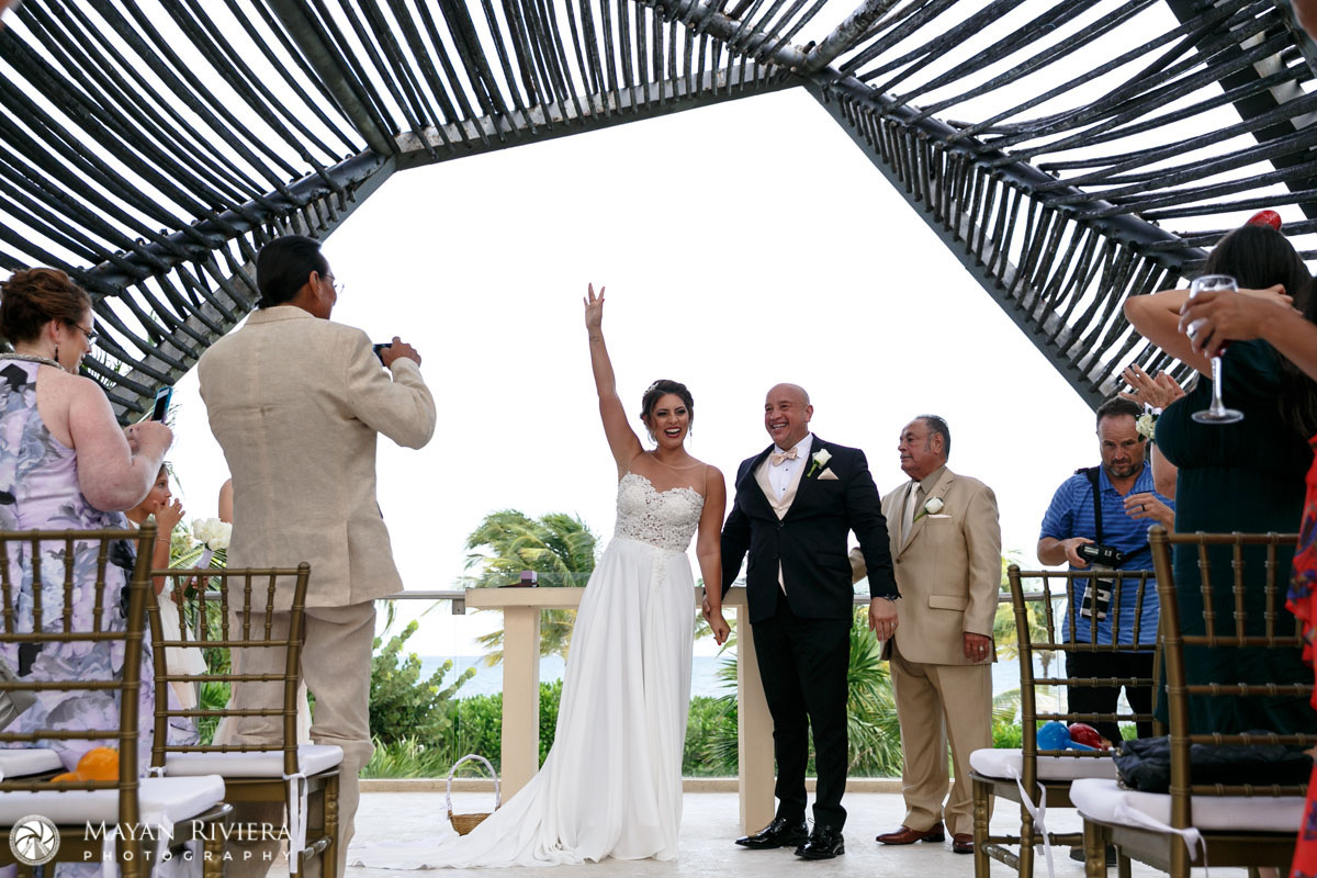 NewlywedsCheerUnderRoyaltonArch