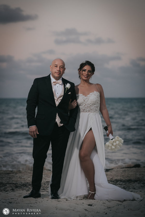 NewlywedsPoseOnBeach