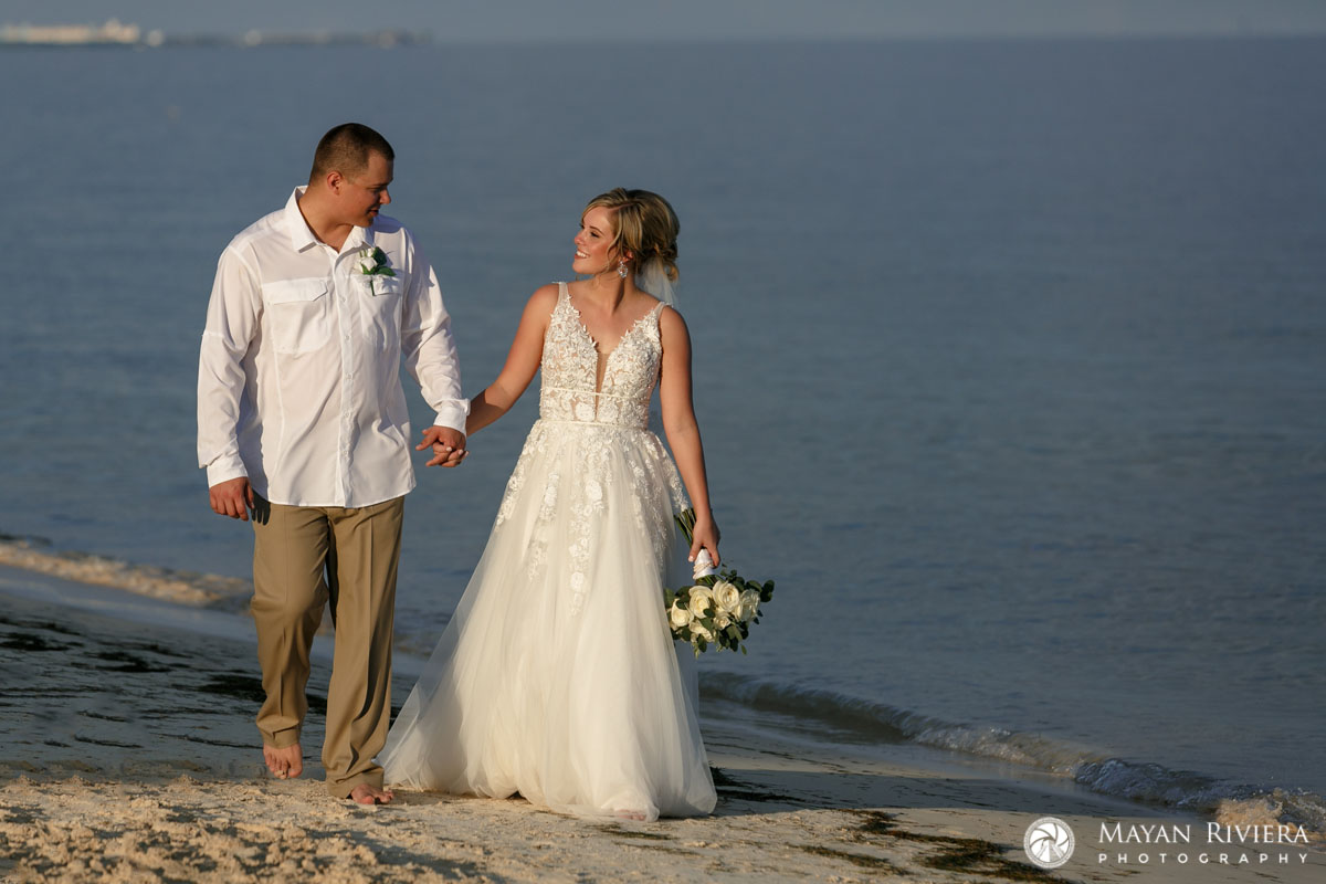NewlywedsStrollOnBeach