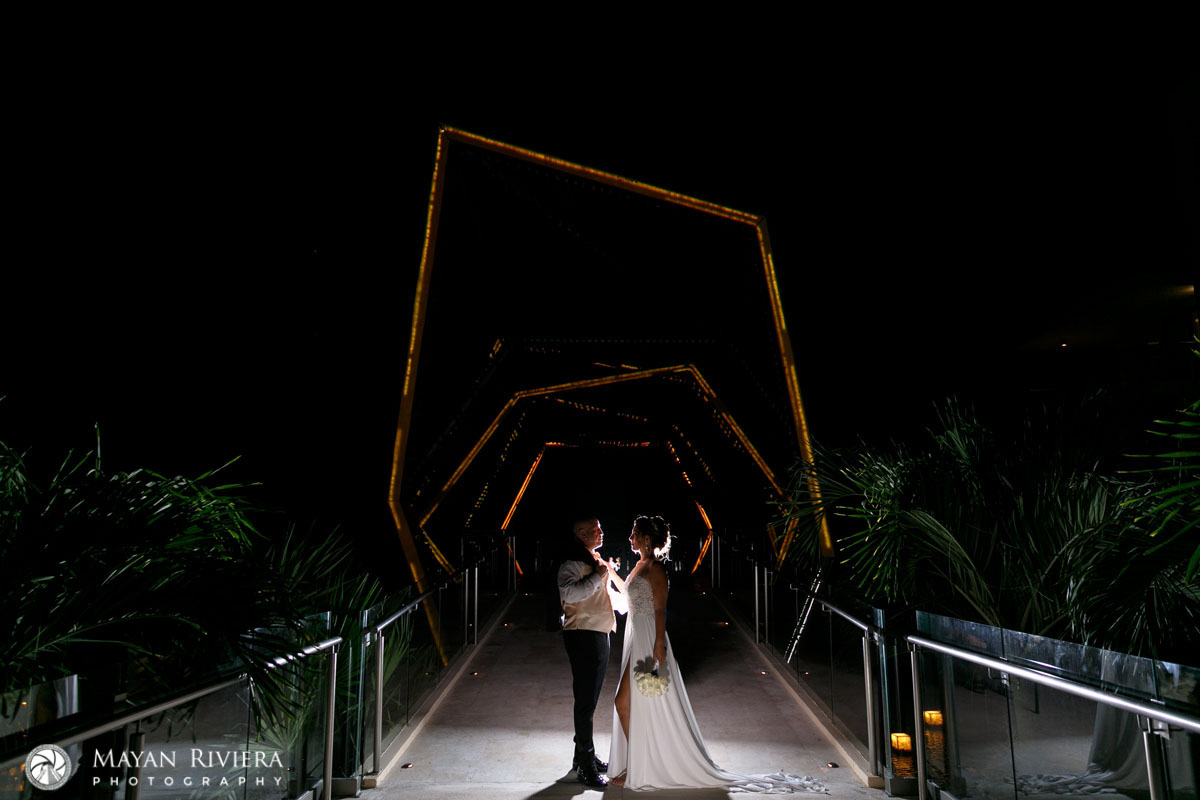 NewlywedsEmbraceOnLitPathway