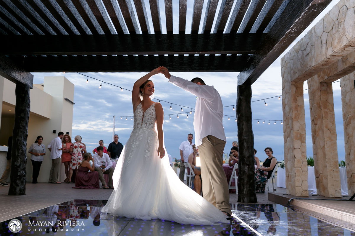 NewlywedsFirstDanceAtRoyaltonRooftopReception