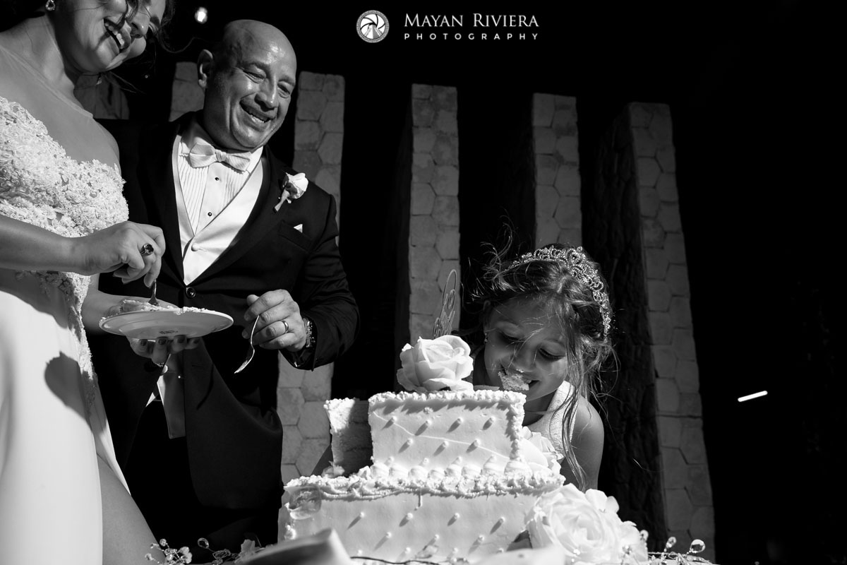 FlowerGirlBitesWeddingCake