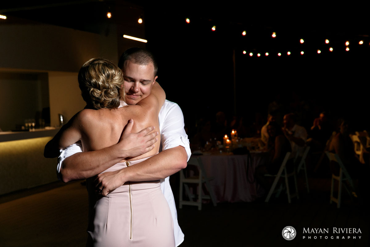 GroomAndMomEmbraceInDance