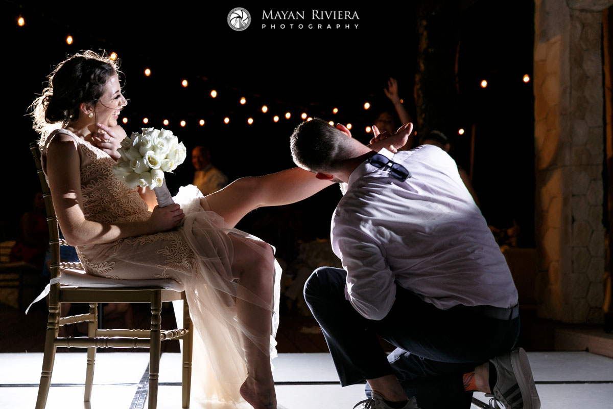 GroomsmanEmbracesBridesmaidsLeg