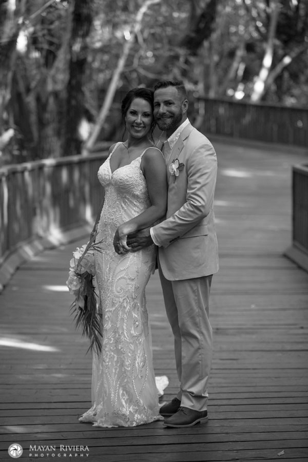 AzulFivesWeddingCouplePoseOnWalkway