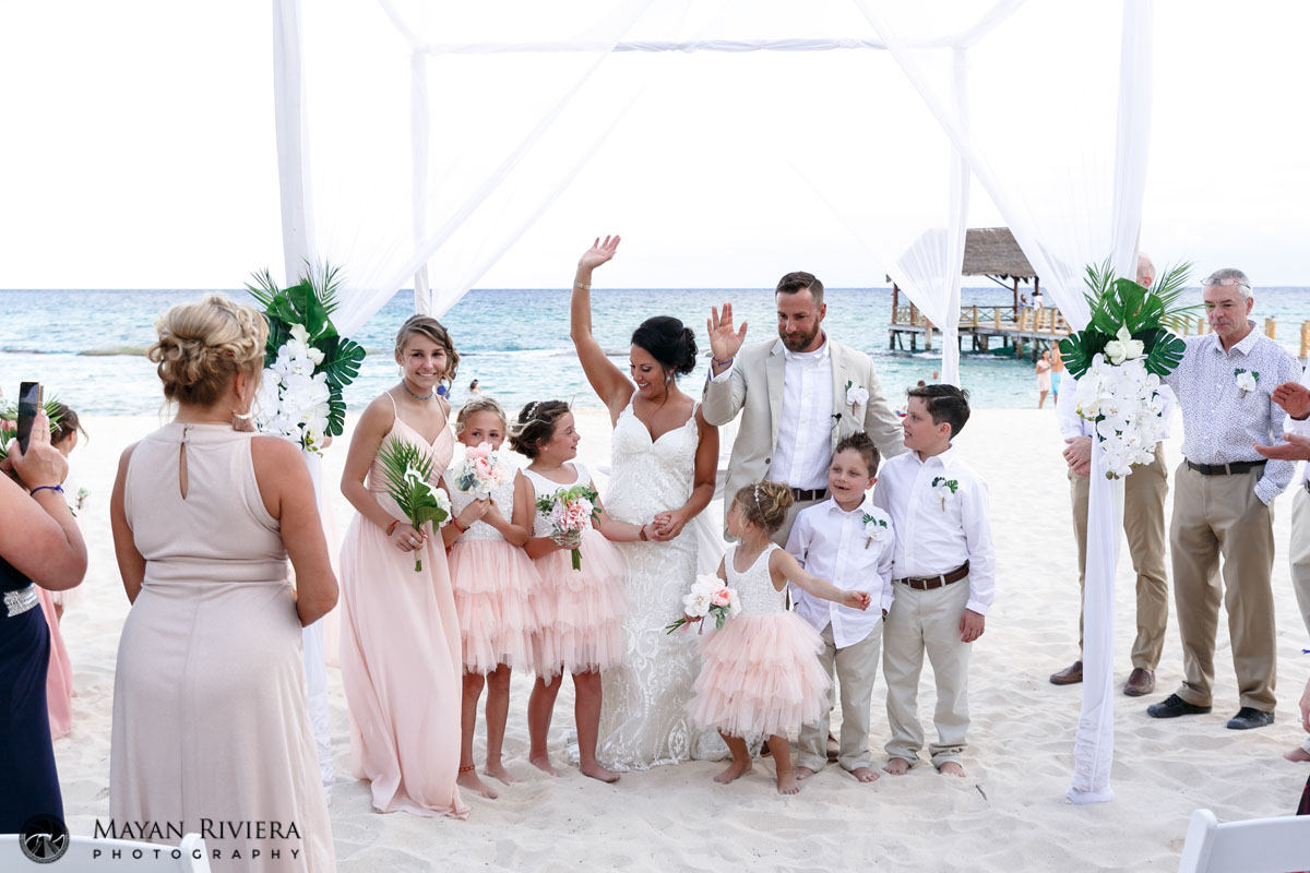 NewlywedsCheerRaisingArms