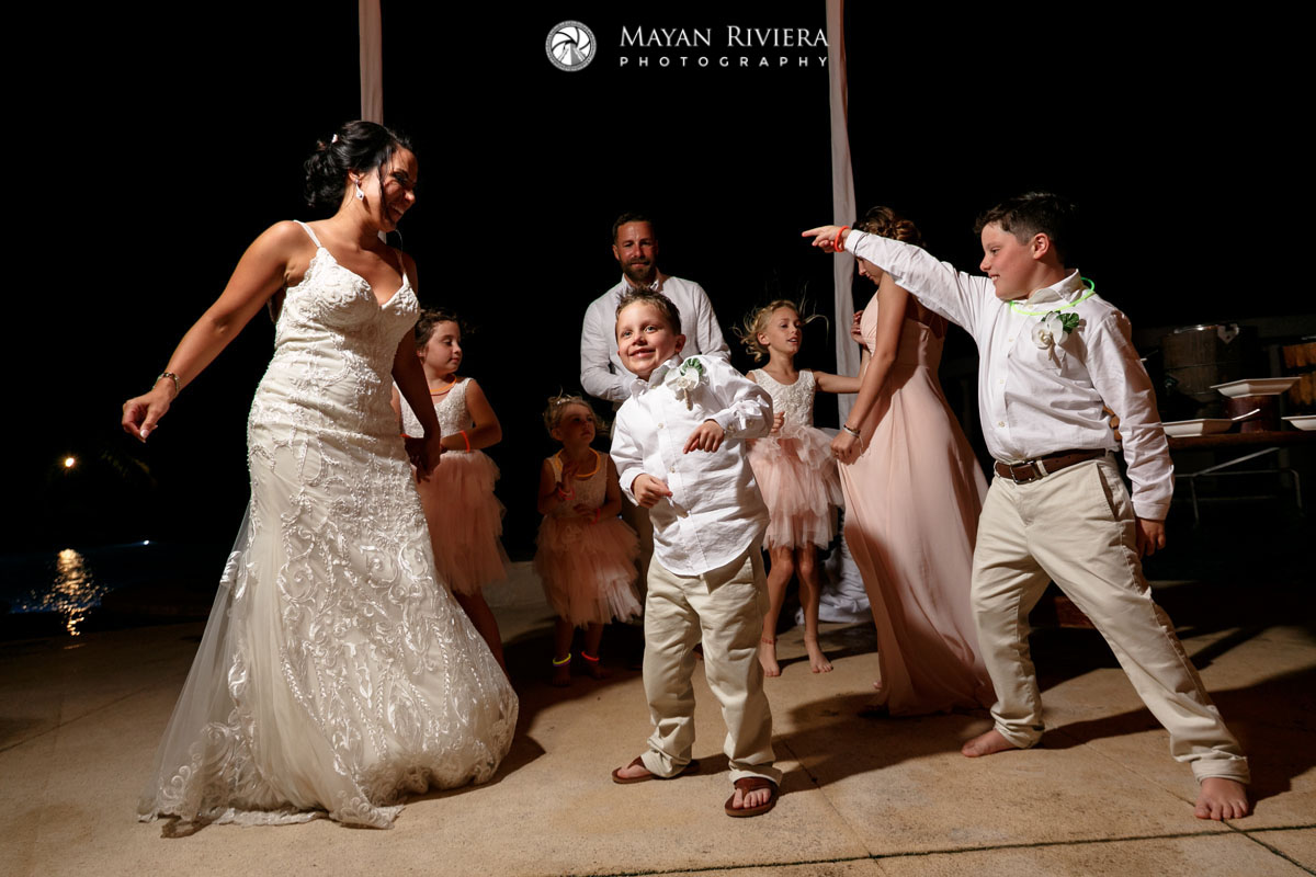 NewlywedsDancingWithKidsAtReception