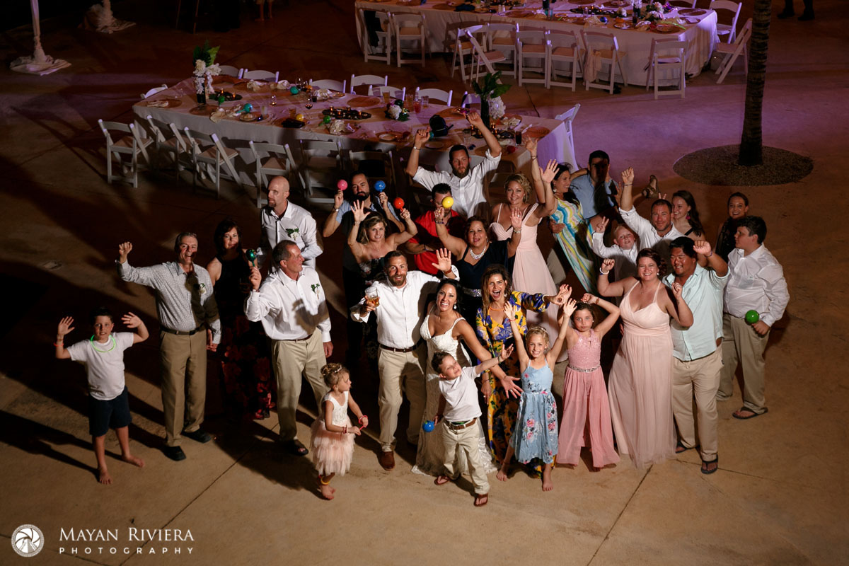 NewlywedsAndKidsCheeringWithGuests