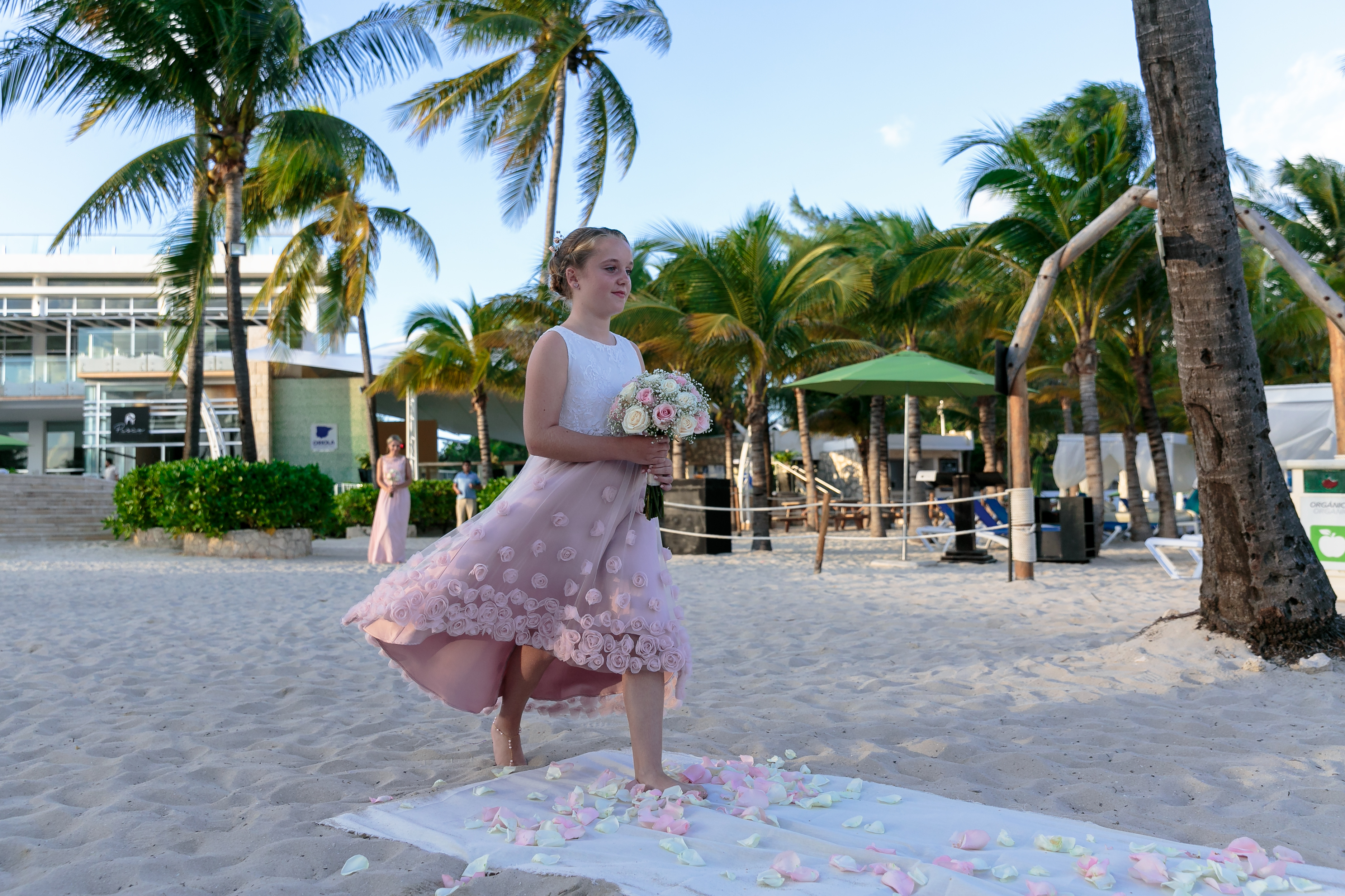 BridesmaidWalkingInOnPetals