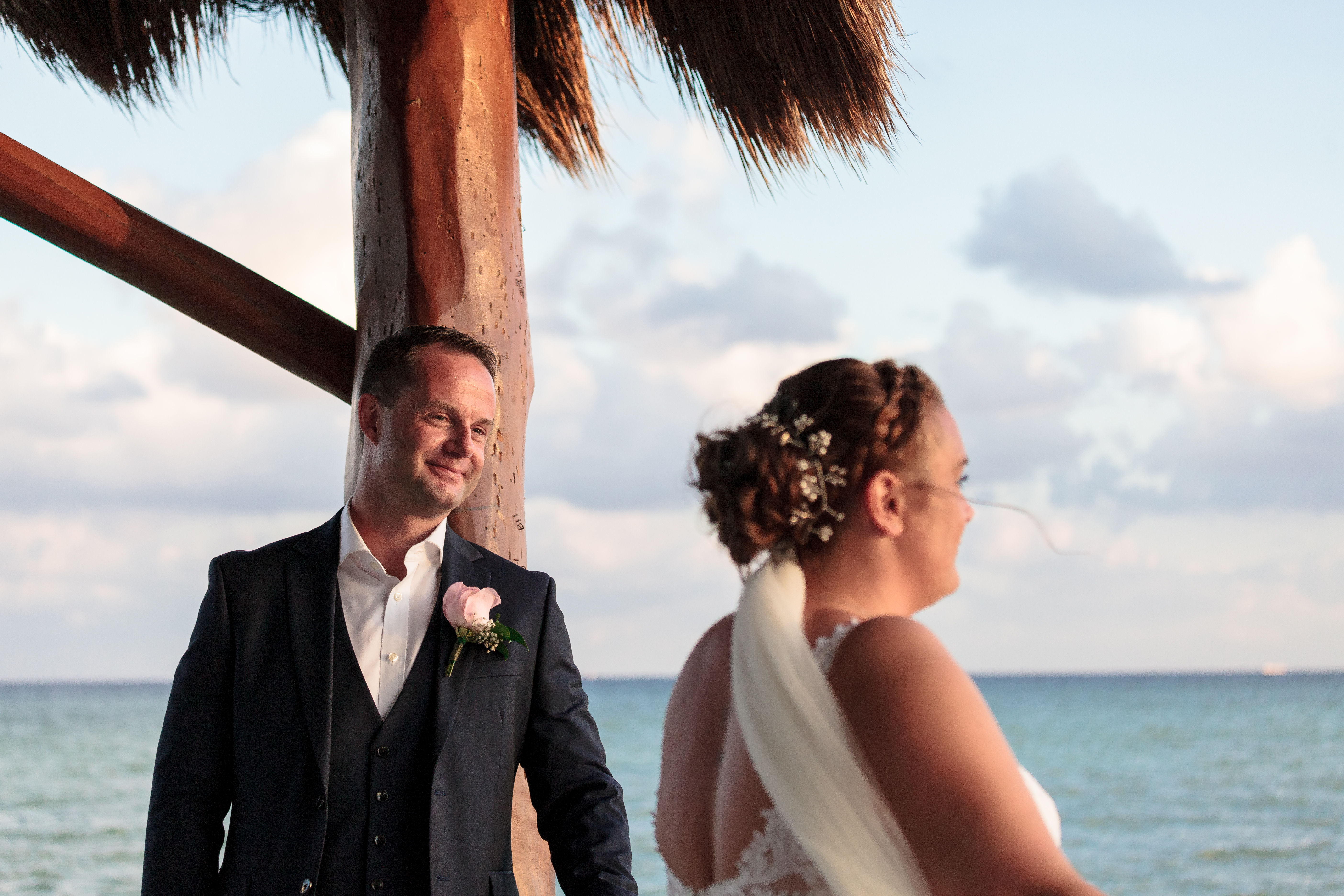 AzulBeachNewlywedsPoseOnPier