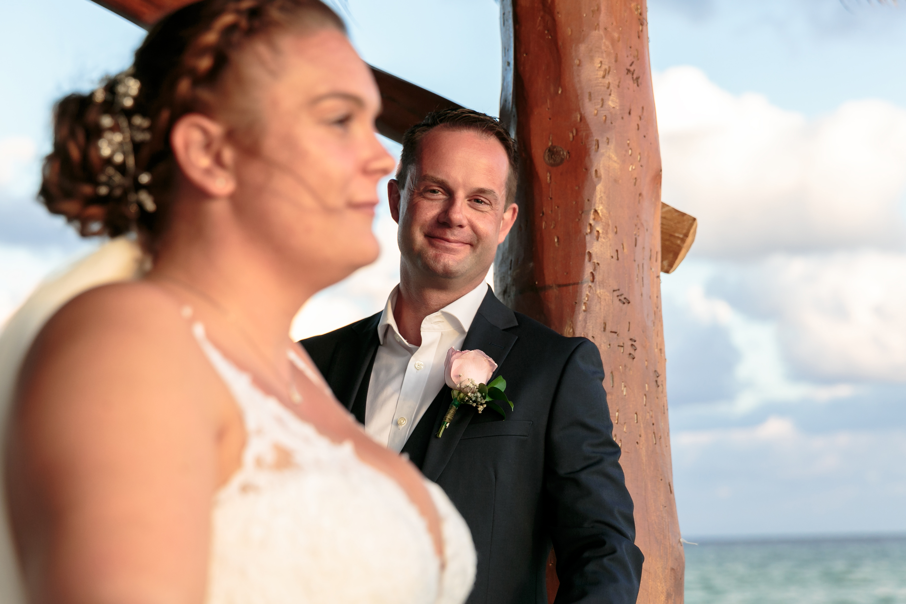 AzulBeachNewlywedsPoseOnPier