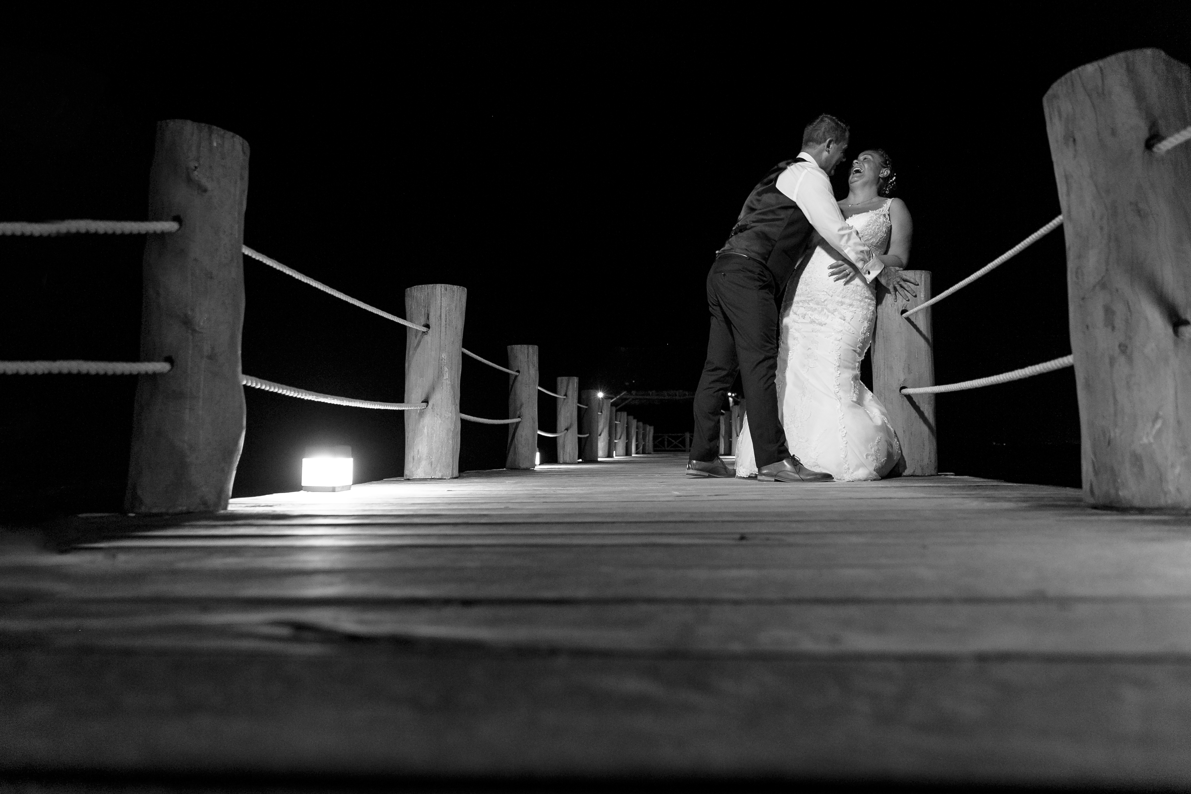 NewlywedsLaughOnPier