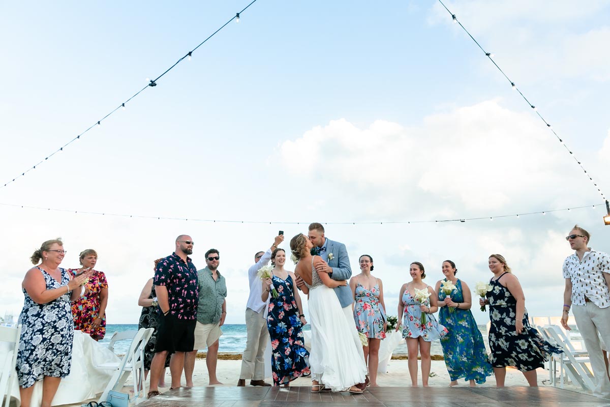 SandosPlayacarNewlywedsKissAfterFirstDance