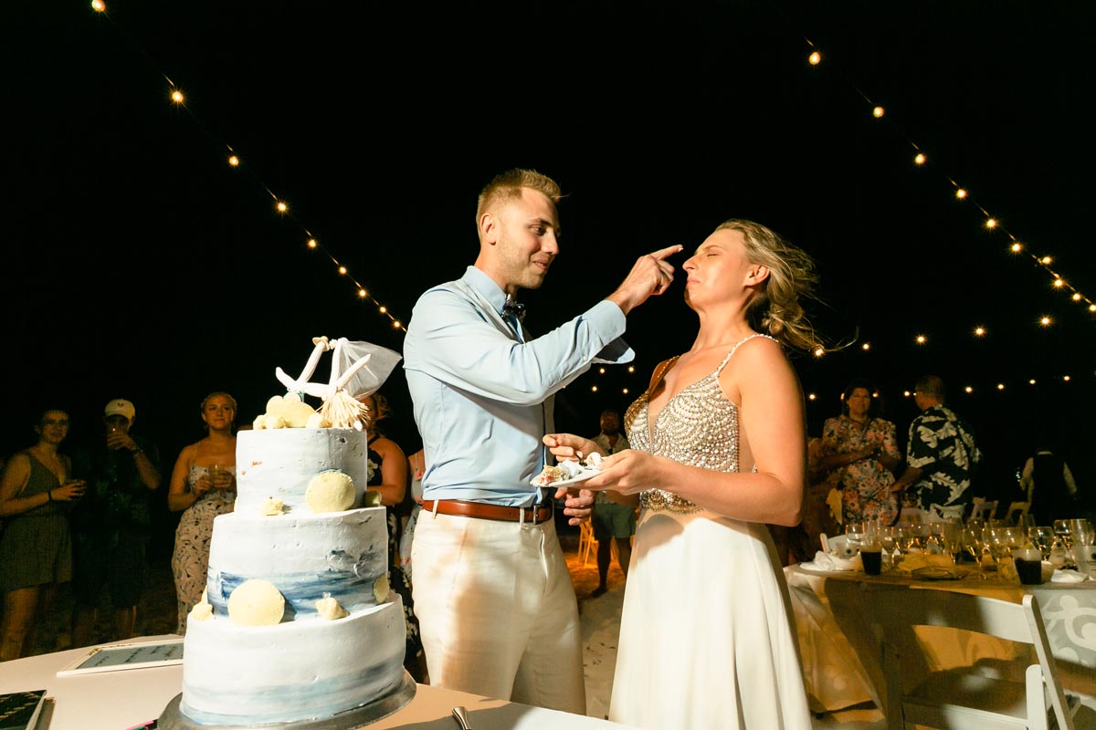 SandosPlayacarGroomDabsIcingOnBridesNose