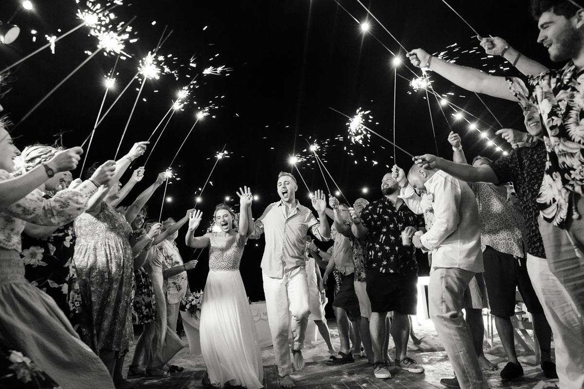 SandosPlayacarNewlywedsCheerInSparklerGauntlet