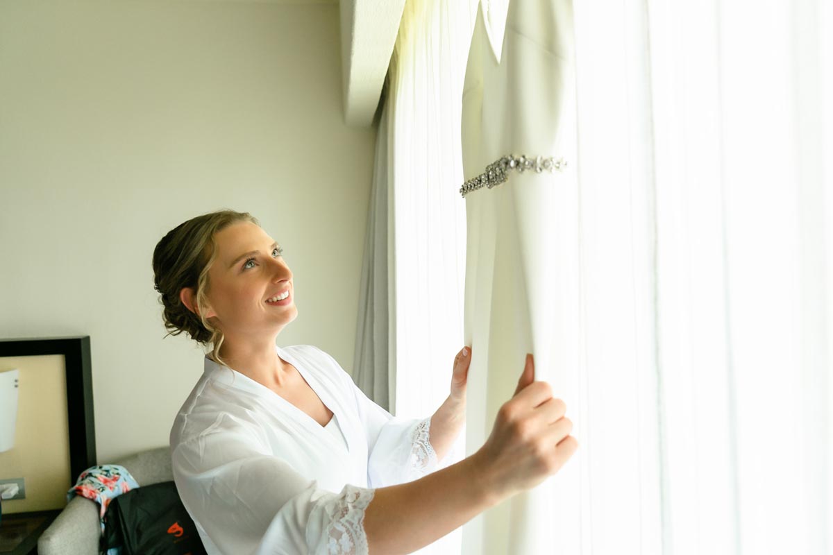 SandosPlayacarBrideKelseyAdmiresHerGown