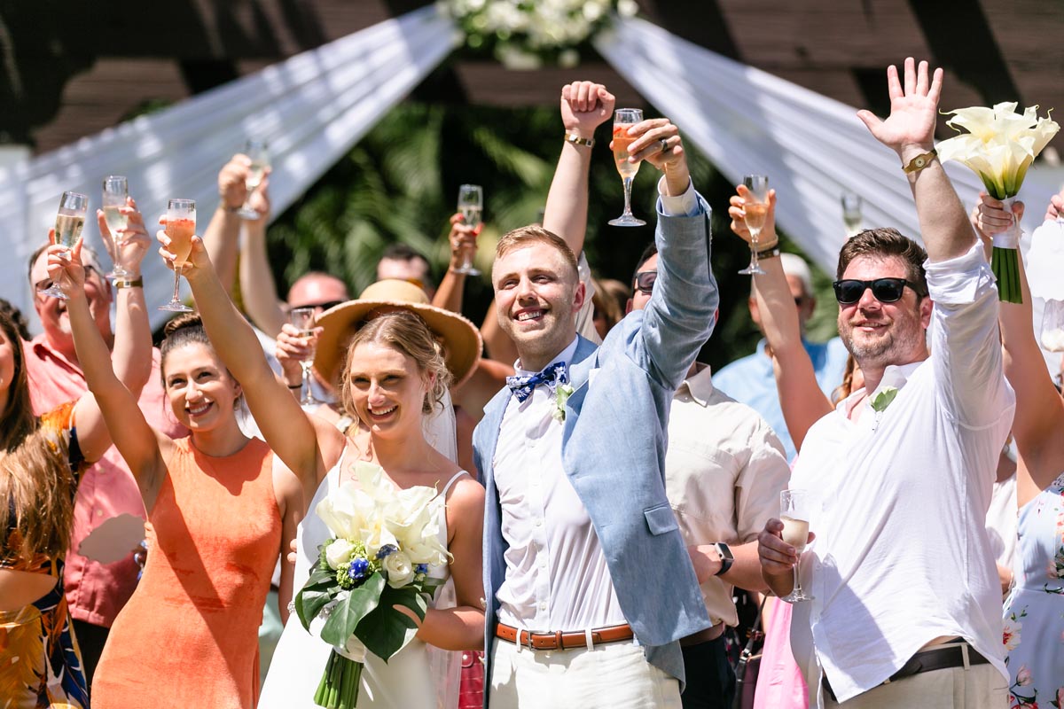 NewlywedsRaiseChampagneToastInDroneShot