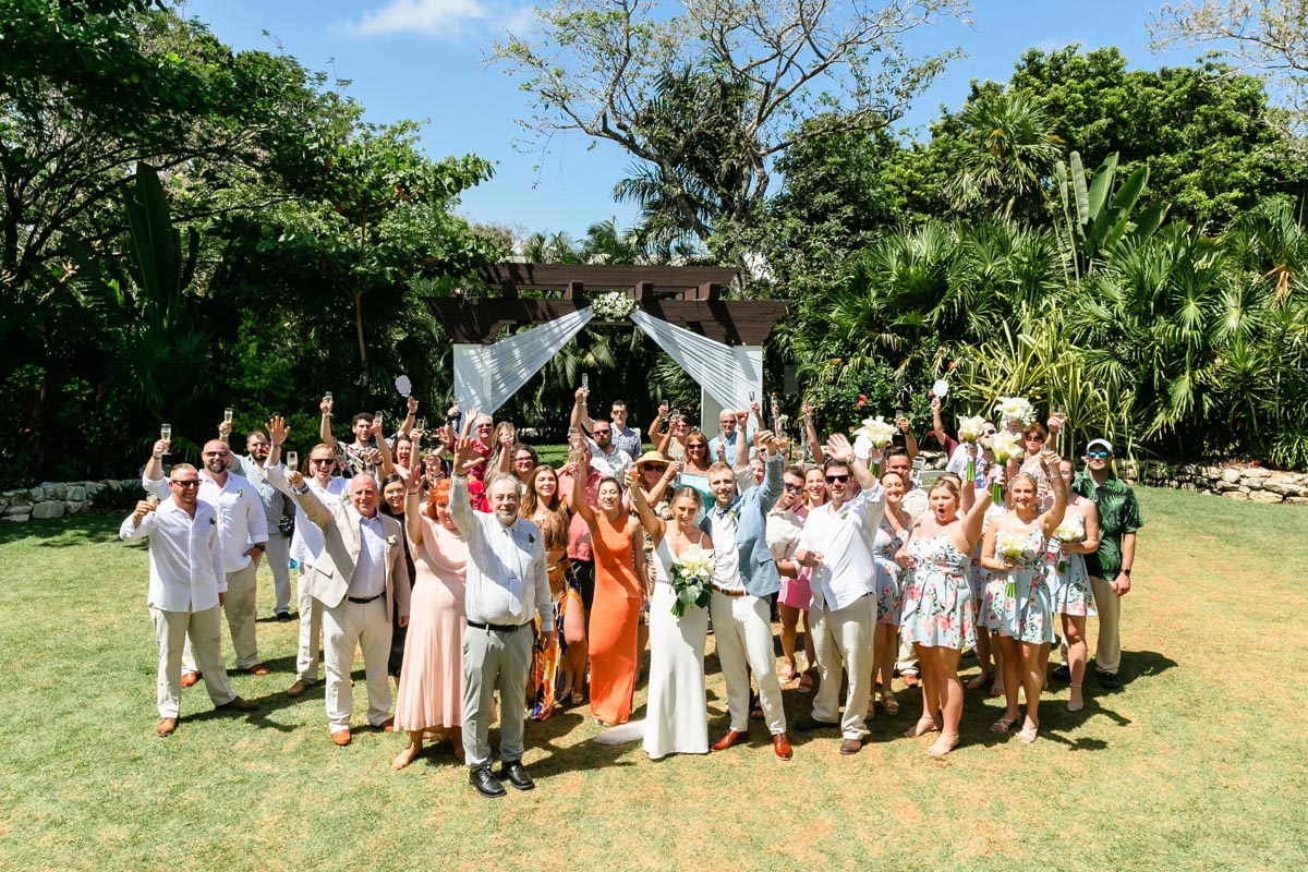 SandosPlayacarGuestsRaiseChampagneToastInDroneShot