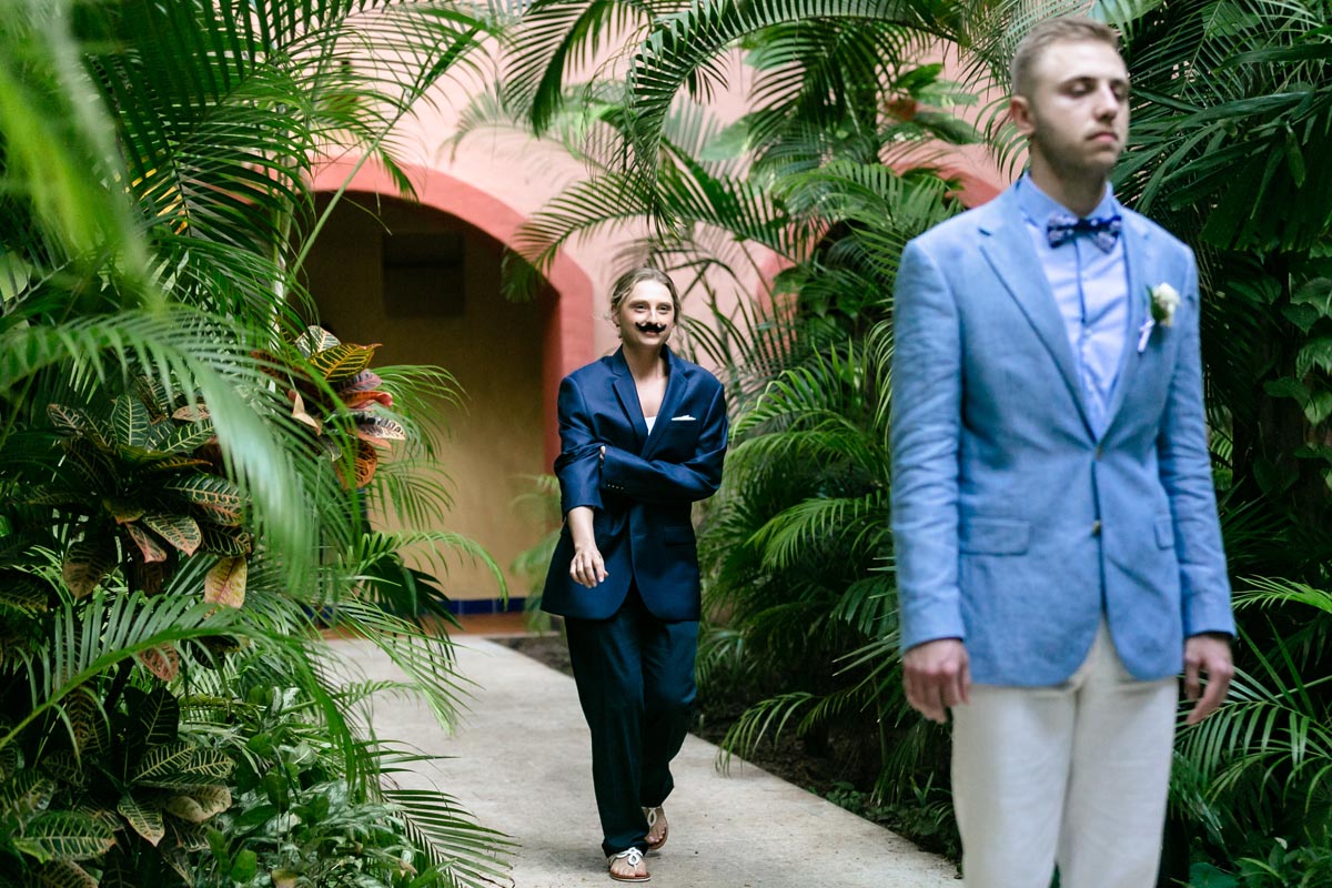 KelseyDressedAsManApproachesAlex