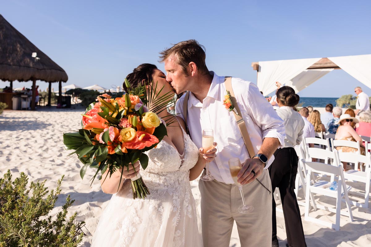 Newlyweds kiss after the ceremony