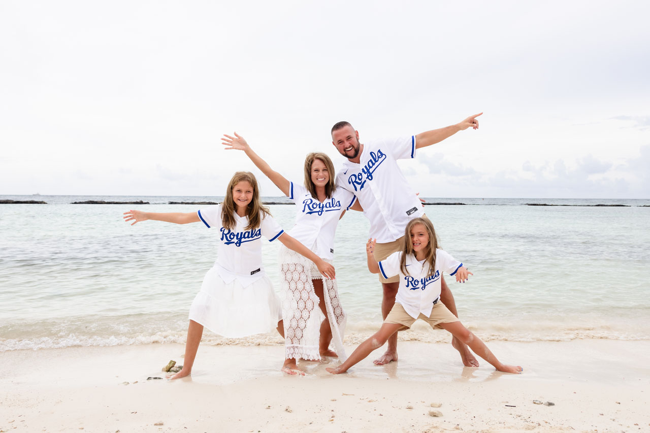 Thomas and family strike a pose on the beach in their Royals jerseys